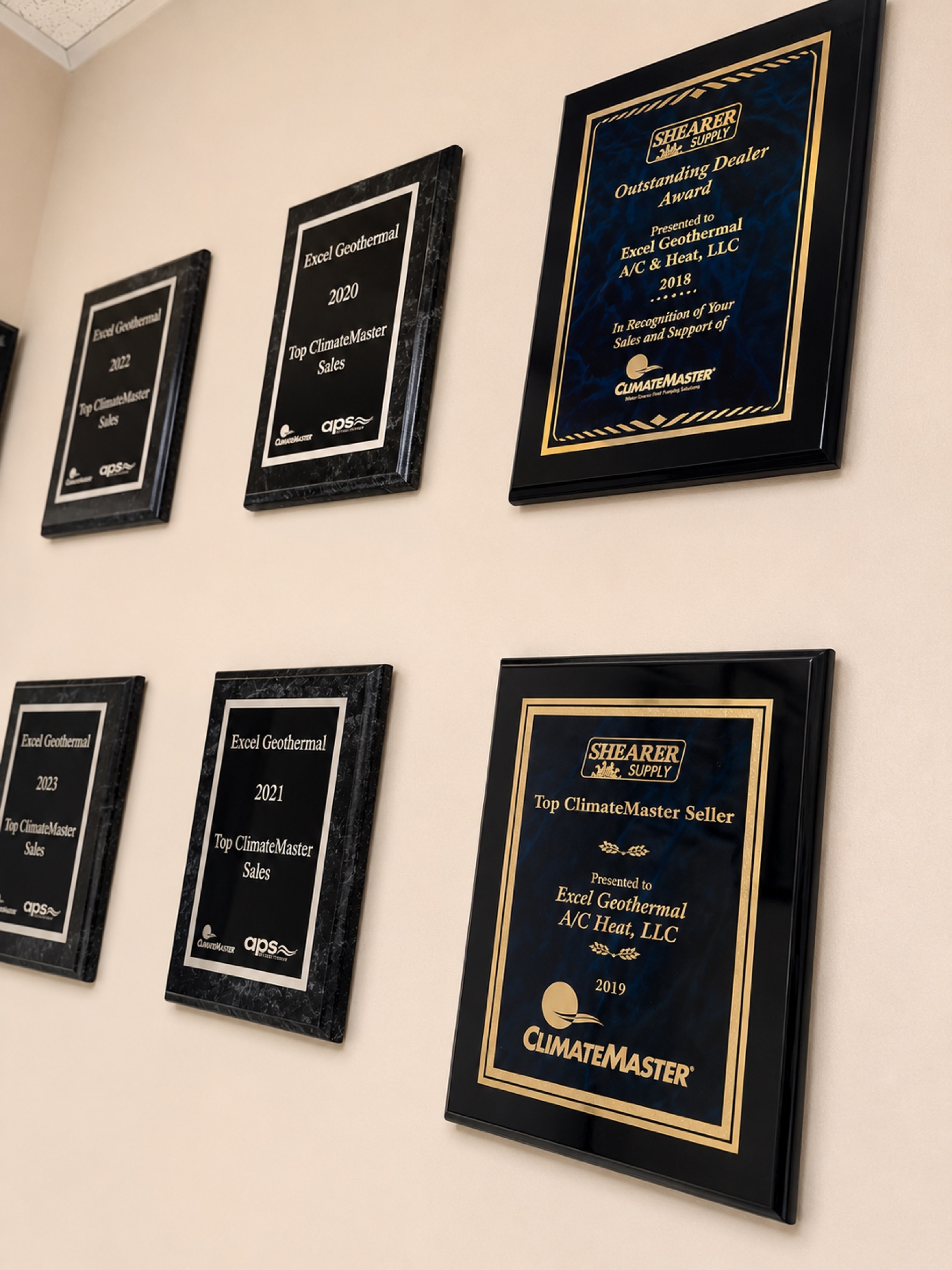Excel Geothermal receiving the ClimateMaster Outstanding Dealer award