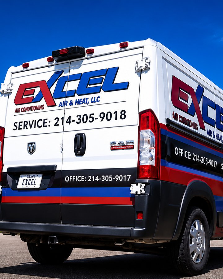 Rear of an Excel Air Conditioning & Heat service van showing the company logo and service phone numbers