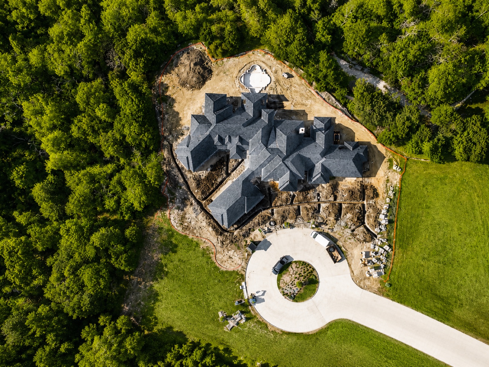 Aerial view of horizontal geothermal loops laid out in open trenches on a Rockwall acreage property