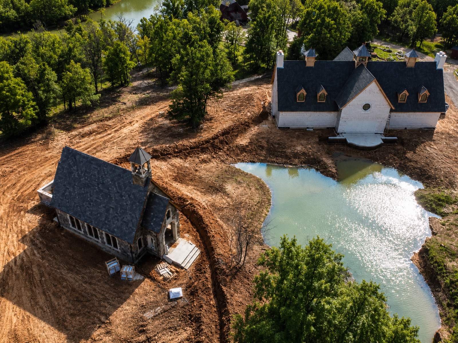 Horizontal geothermal trenches dug 6 to 10 feet deep with loop pipe laid in